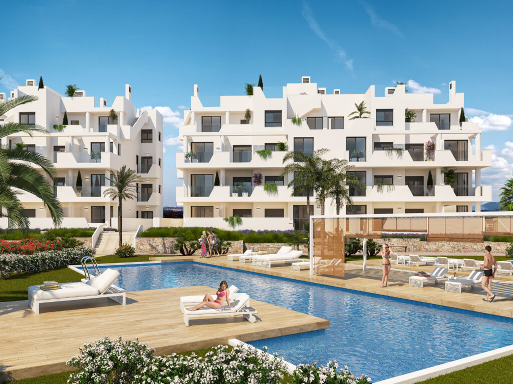 Gemeenschappelijk zwembad en vooraanzicht van nieuwbouw appartementen in Santa Rosalia in Spanje, gelegen aan de  Costa Cálida